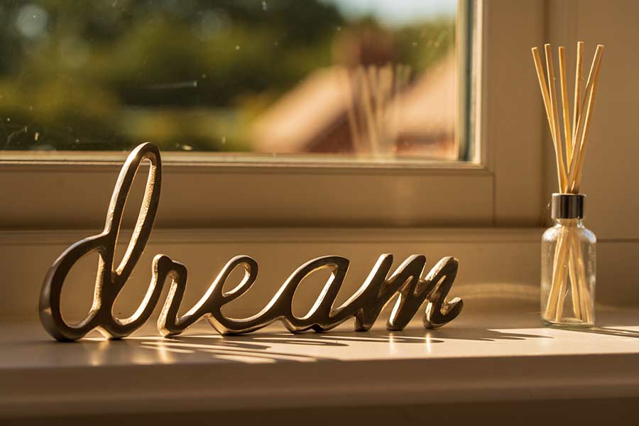 Sign reading "dream" in a new home