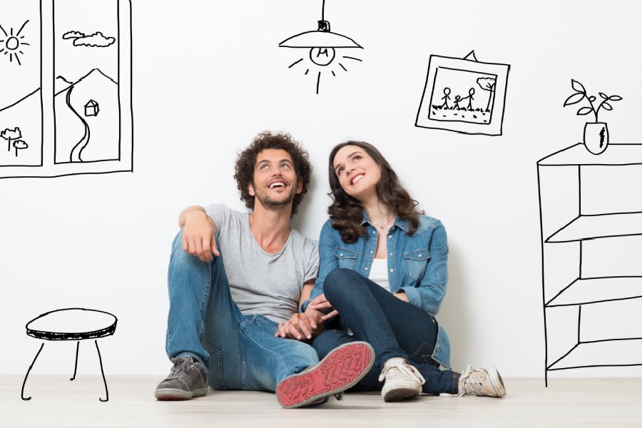 Two people sitting and thinking about homes for sale in Caldwell County TX.