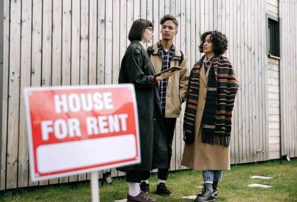 Lockhart real estate Agent Explaining Policies to a Couple Who is Going to Rent Their Property